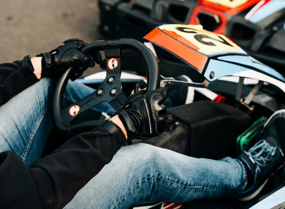 Go-kart driver at the wheel